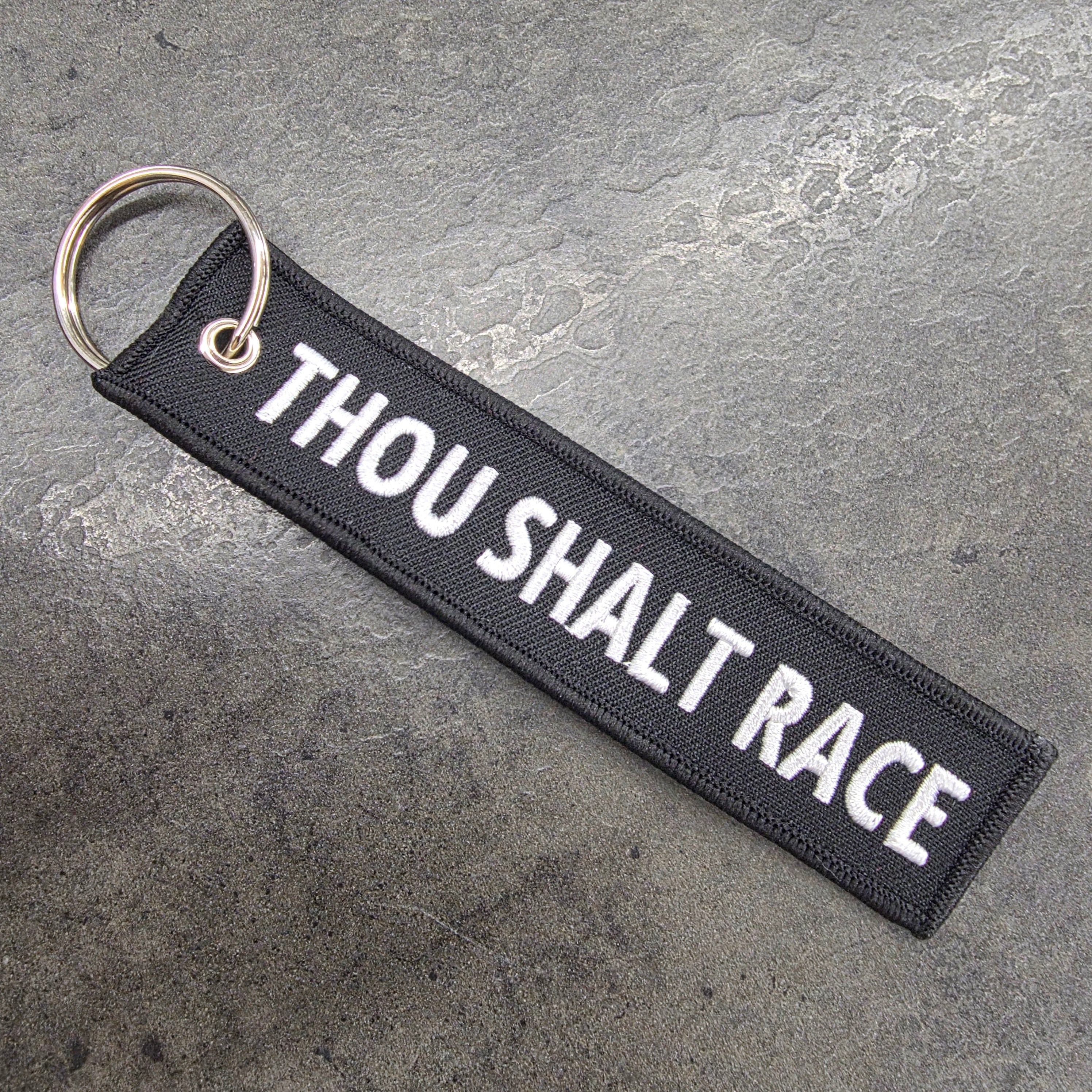THOU SHALT RACE KEYCHAIN